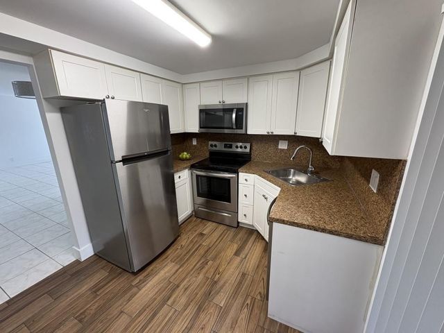 68 Wimbledon Lake Drive 68, Plantation, FL 33324