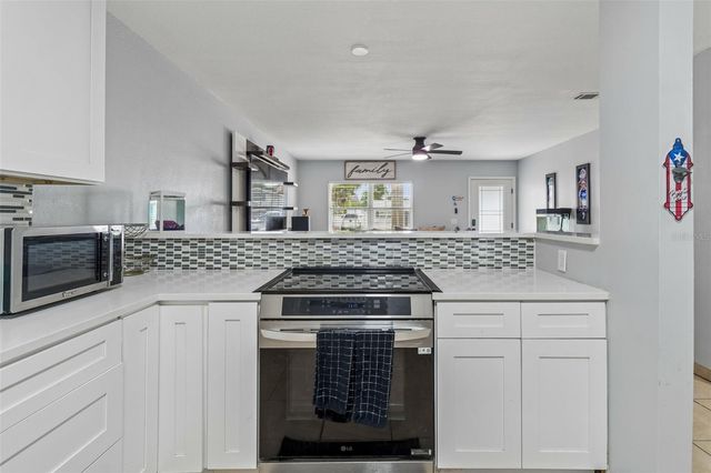 7705 JACKSON SPRINGS ROAD, Tampa, FL 33615
