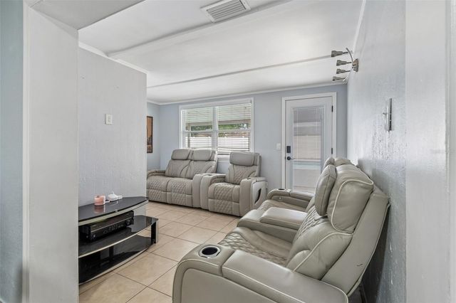 7705 JACKSON SPRINGS ROAD, Tampa, FL 33615