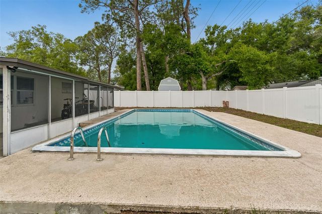 7705 JACKSON SPRINGS ROAD, Tampa, FL 33615