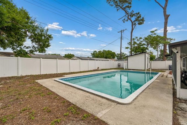 7705 JACKSON SPRINGS ROAD, Tampa, FL 33615