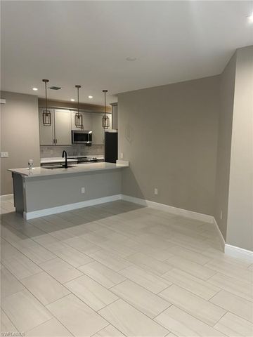 7553 Carnegie WAY, Naples, FL 34119