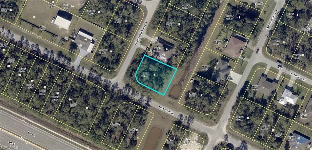 3009/3011 Hightower AVE S, LEHIGH ACRES, FL 33973 — exterior