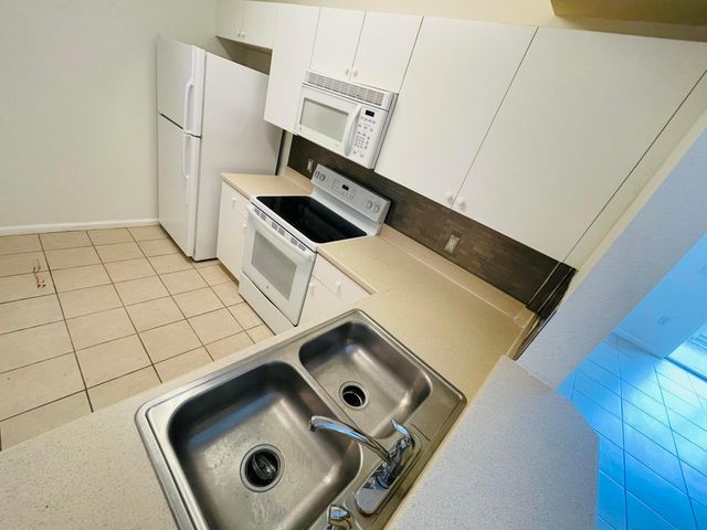 1055 Golden Lakes Boulevard 212, West Palm Beach, FL 33411
