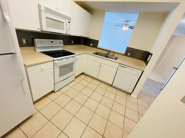 1055 Golden Lakes Boulevard 212, West Palm Beach, FL 33411