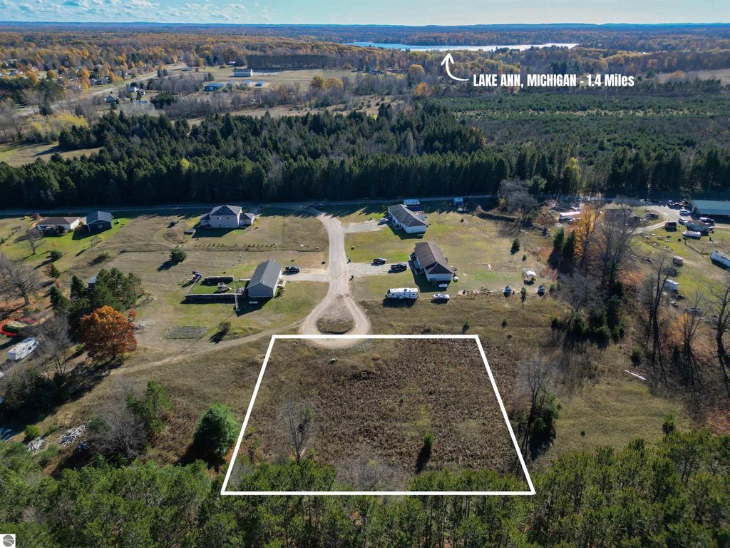 Image 1 of property listing at TBD Tiger Drive, Lake Ann, MI 49650