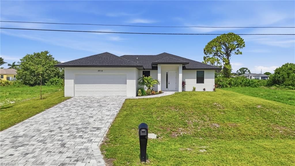2210 NW 9th AVE, CAPE CORAL, FL 33993 — photo 2