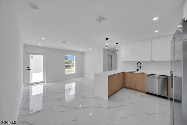 747 Fleming AVE S, Lehigh Acres, FL 33974
