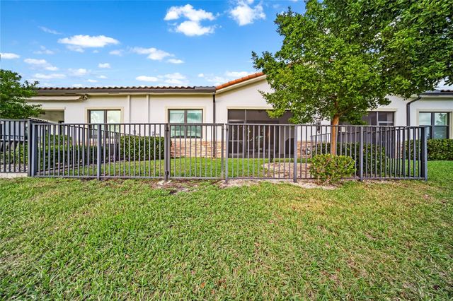 7636 N Blue Spring Drive 7636, Parkland, FL 33067