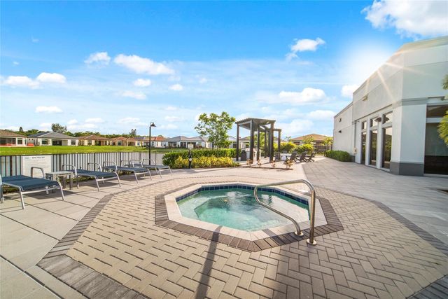 7636 N Blue Spring Drive 7636, Parkland, FL 33067