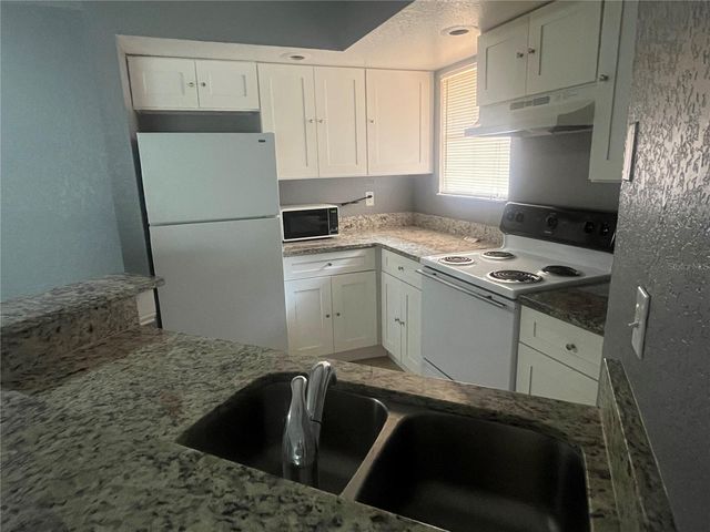 4548 COMMANDER DRIVE 1412, Orlando, FL 32822