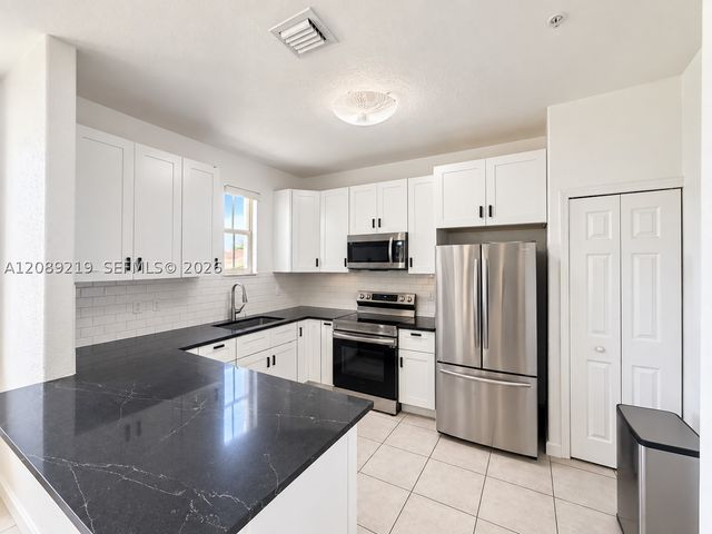 10242 NW 7th St 203, Miami, FL 33172