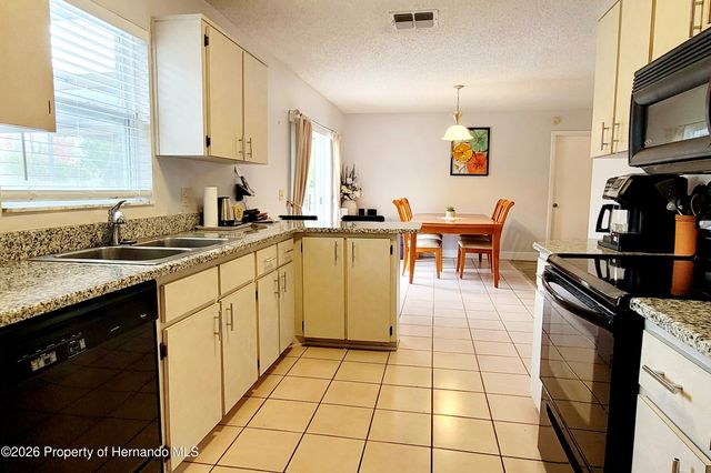 11144 Heathwood Avenue, Spring Hill, FL 34608