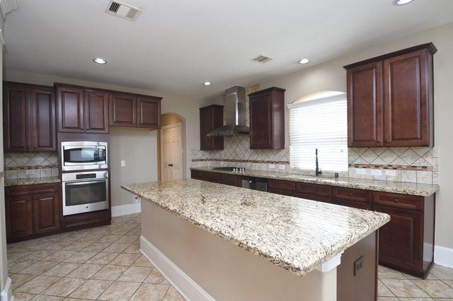 606 Whitney Oaks Lane, Stafford, TX 77477