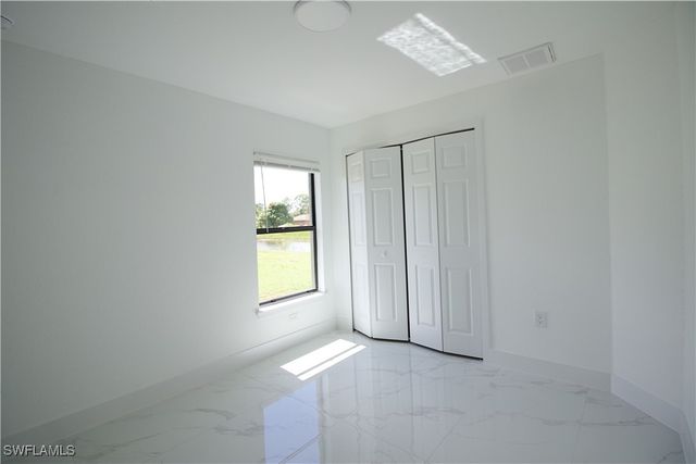 118 Parish DR, Lehigh Acres, FL 33974
