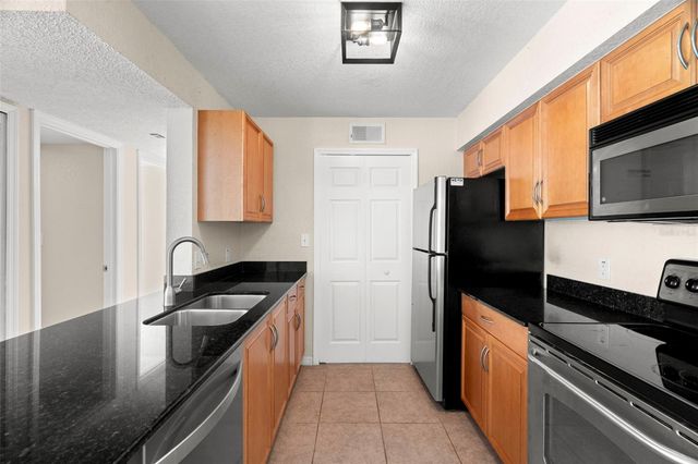 3310 HAVILAND COURT 203, Palm Harbor, FL 34684