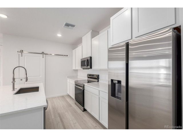 6153 N Ceylon St 3-204, Denver, CO 80249