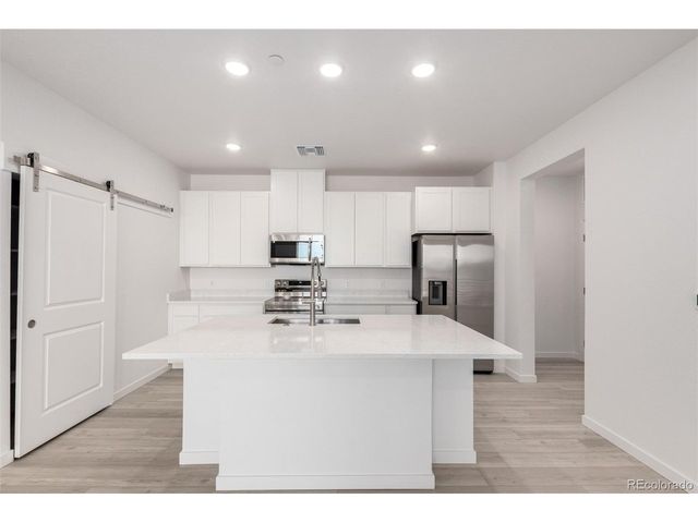 6153 N Ceylon St 3-204, Denver, CO 80249