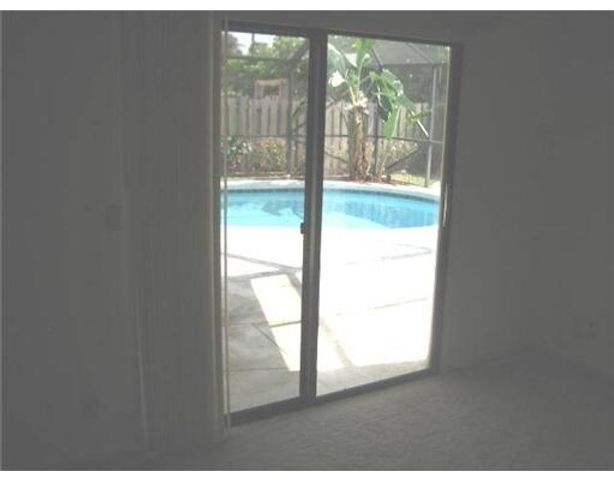 6050 Amberwoods Drive, Boca Raton, FL 33433