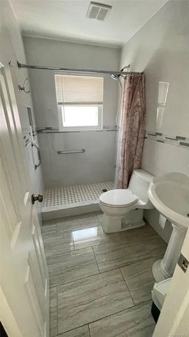 8015 260th Street, Glen Oaks, NY 11004