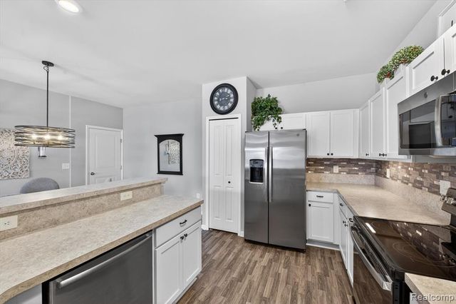 9789 Ridge Run Street, Howell, MI 48855