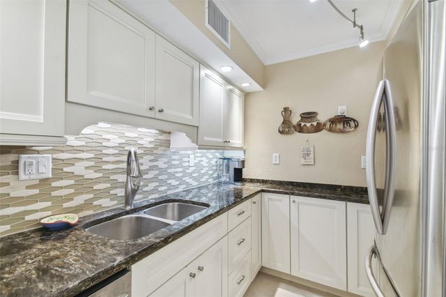 10355 PARADISE BOULEVARD 702, Treasure Island, FL 33706