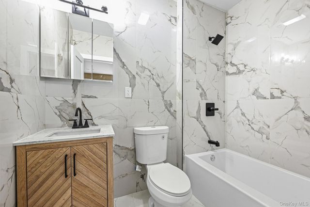 9210 104th Street, Richmond Hill, NY 11418