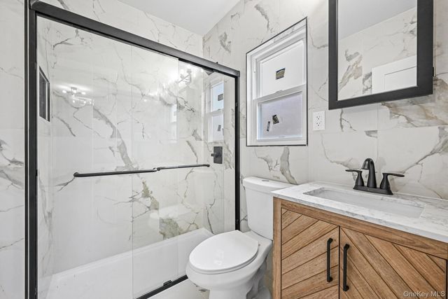 9210 104th Street, Richmond Hill, NY 11418