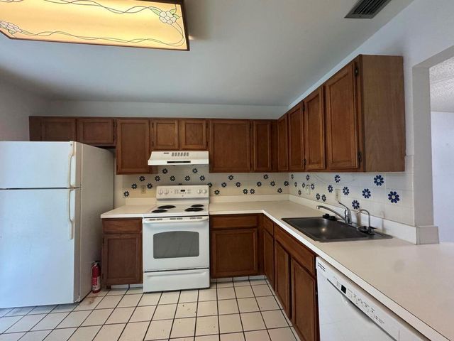 320 Elmira Court, Royal Palm Beach, FL 33411