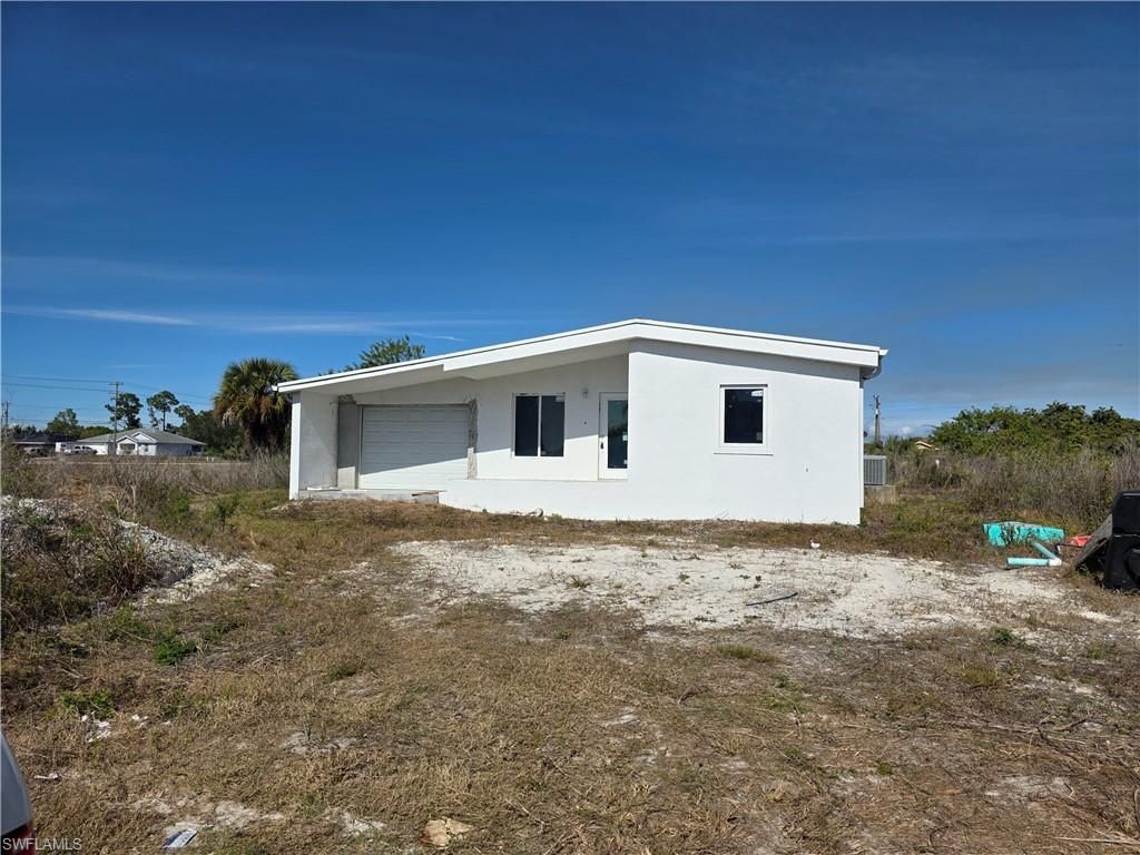 3030 39th ST SW, LEHIGH ACRES, FL 33976 — exterior