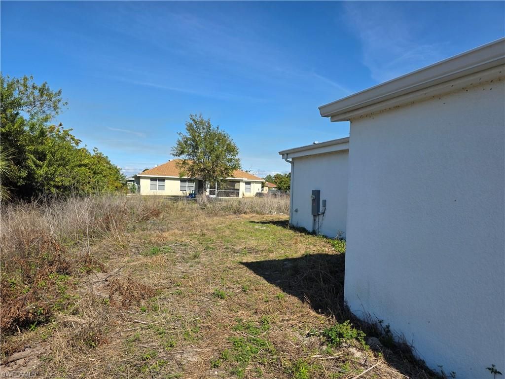 3030 39th ST SW, LEHIGH ACRES, FL 33976 — photo 4