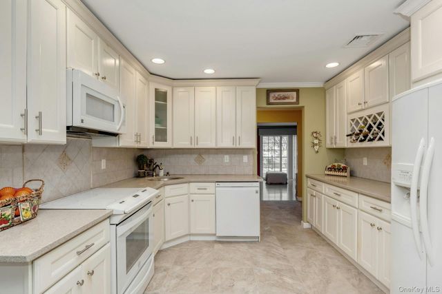 84 Strathmore Village Drive, South Setauket, NY 11720