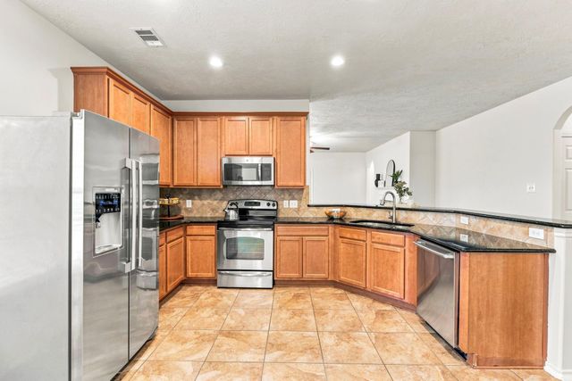 23410 W Pine Ivy Lane, Tomball, TX 77375
