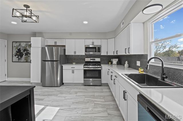 3300 Tom Sawyer Drive, Florissant, MO 63033