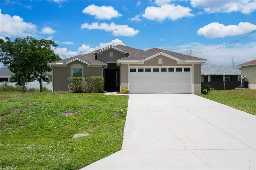 1220 NW 36th PL, CAPE CORAL, FL 33993 — exterior