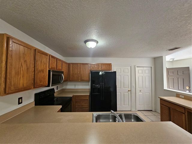 752 CRESTING OAK CIRCLE 64, Orlando, FL 32824