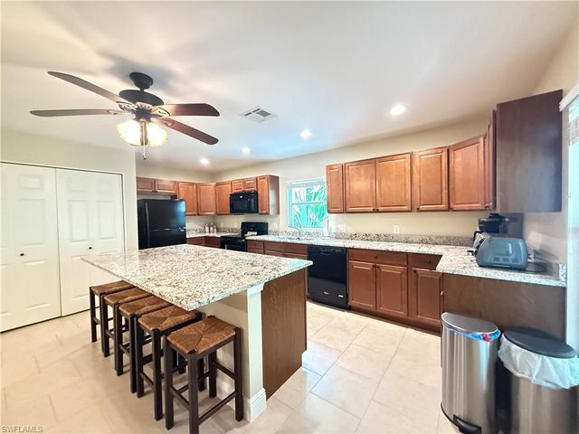 6140 Standing Oaks, Naples, FL 34119