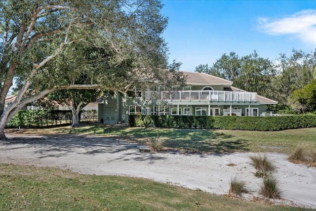 7 Alnwick Road, Palm Beach Gardens, FL 33418