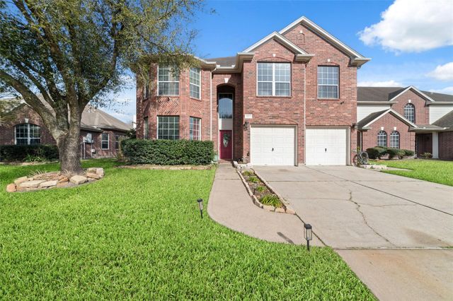 18914 Woodglen Shadows Drive, Humble, TX 77346