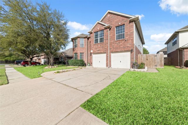 18914 Woodglen Shadows Drive, Humble, TX 77346