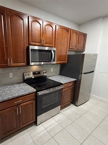 6265 CONTESSA DRIVE 303, Orlando, FL 32829