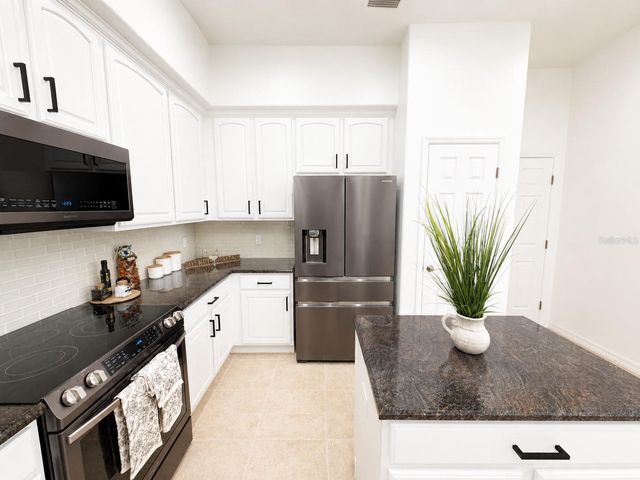 8766 THE ESPLANADE 23, Orlando, FL 32836