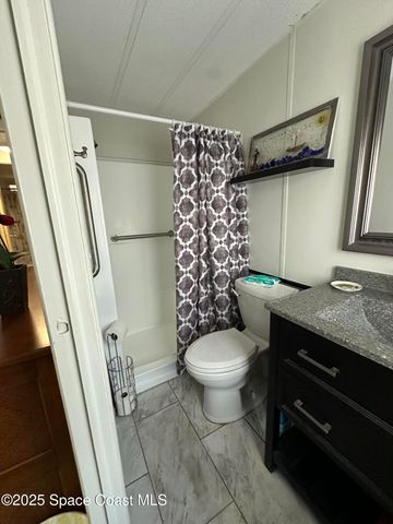 1437 Barefoot Circle, Barefoot Bay, FL 32976