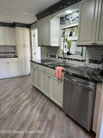 1437 Barefoot Circle, Barefoot Bay, FL 32976