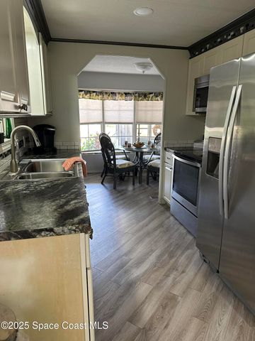 1437 Barefoot Circle, Barefoot Bay, FL 32976
