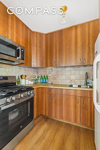 6120 71st Ave Apt J1B, New York City, NY 11385