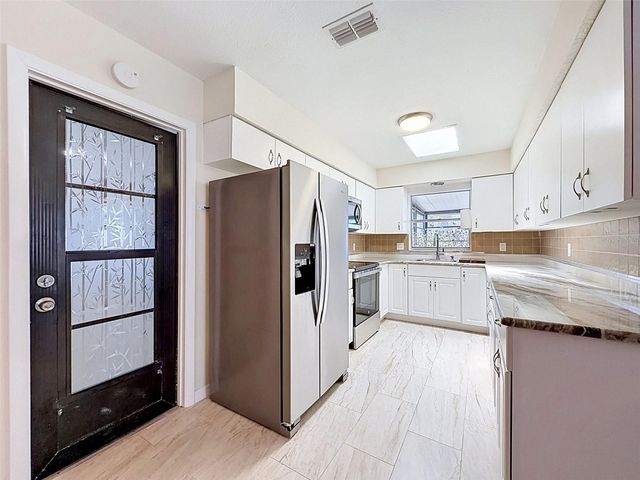 7038 SOUTHWIND DRIVE, Hudson, FL 34667
