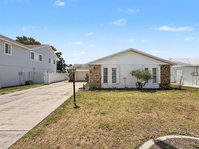 7038 SOUTHWIND DRIVE, Hudson, FL 34667