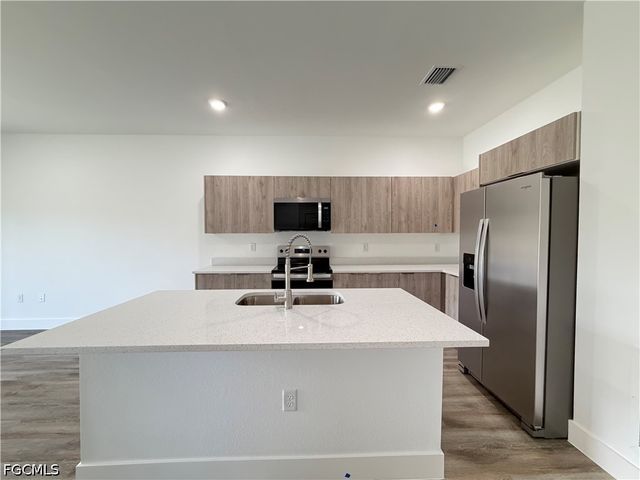 1256 MILWAUKEE BLVD, Lehigh Acres, FL 33974