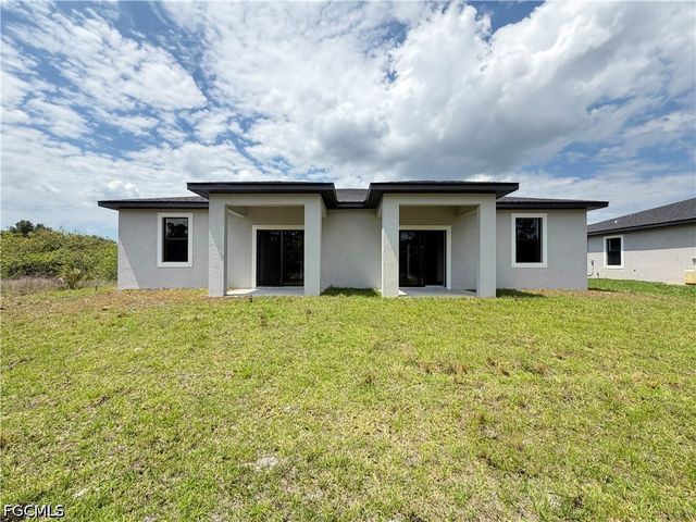 1256 MILWAUKEE BLVD, Lehigh Acres, FL 33974
